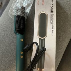 Straightening comb. New In Box.