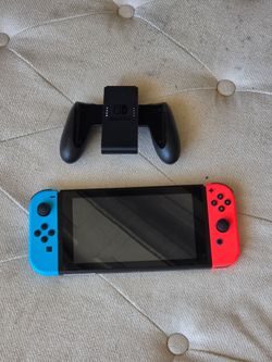 Nintendo Switch with Neon Joy-Cons and Grip