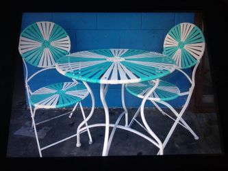 Metal TABLE AND CHAIRS WE are ACCEPTING OFFERS