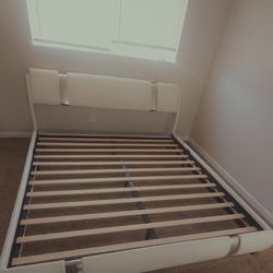 Modern Faux Leather Upholstered Platform Bed Frame, Queen Size, White with Mirror Metal Decoration Curved Headboard Wooden Slats Support No Box Spring