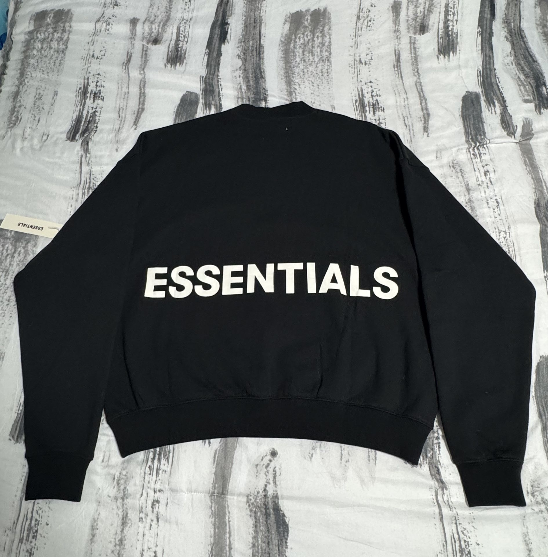 Essentials Fear of God crewneck sweater in black. Relaxed fit