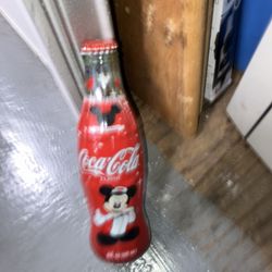 Numerous Filled Coca Cola Bottles 