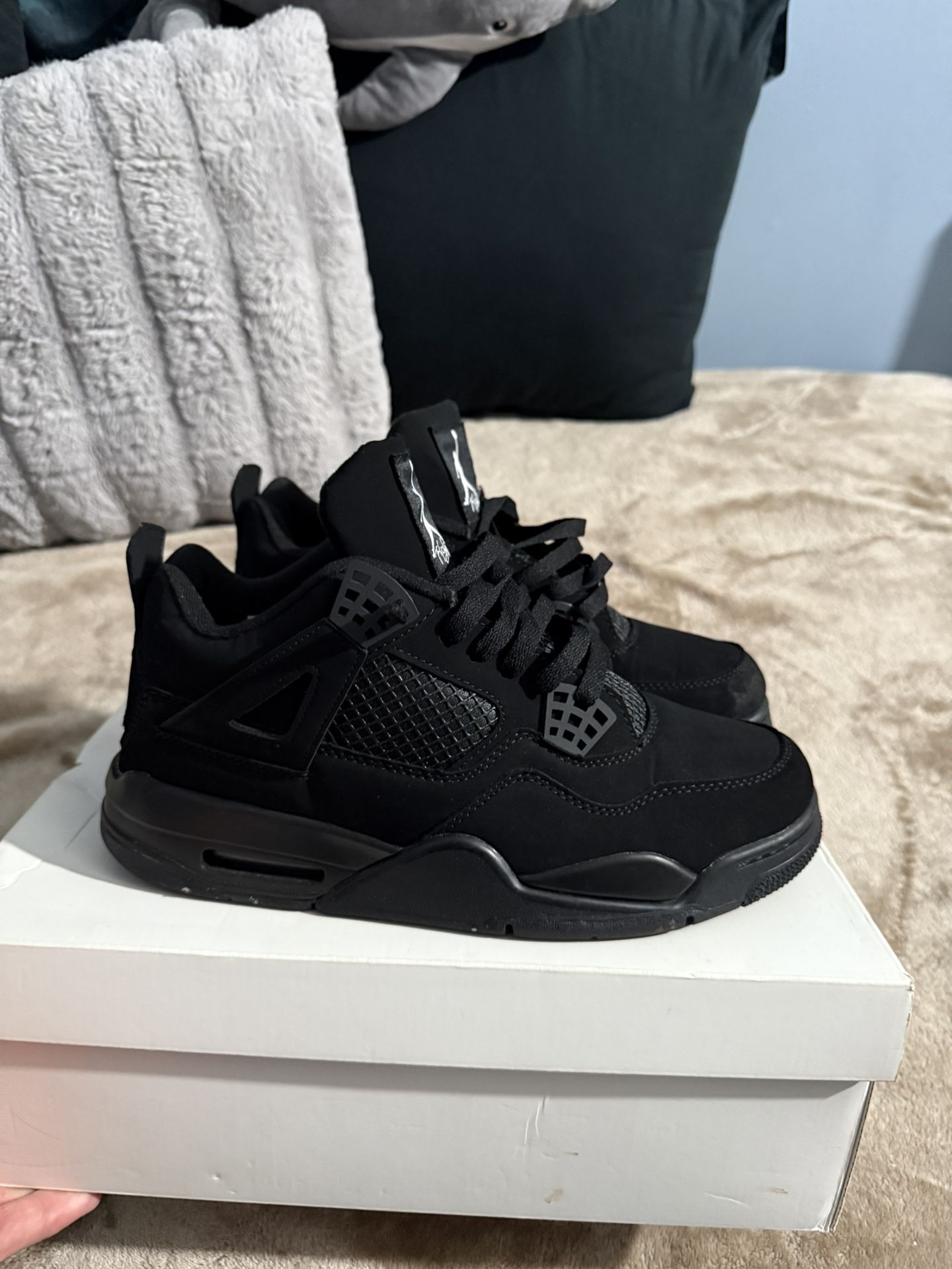 Jordan 4 Black Cat