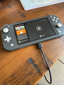 Nintendo Switch Lite Console + 3 Games