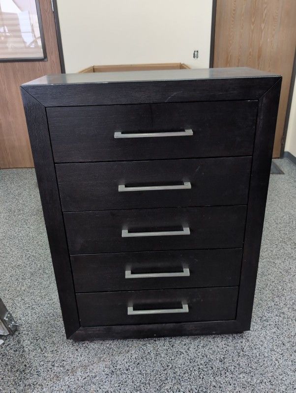 Bob's Furniture Cosmopolitan Tall Black Dresser With Lidded Mirror And Jewelry Area.