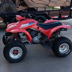 RED 1994 HONDA TRX 300EX