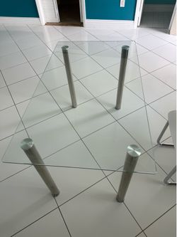 Mesa de comedor de cristal