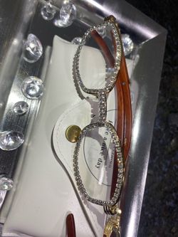 Millionaire Celebrity Glasses “Look Like Money” One (1) Unisex wooden frame with sparkling lab, diamond ice trim. Comes with a white protective case f