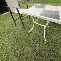 PATIO TABLE with one barstool.( free perennial plant)
