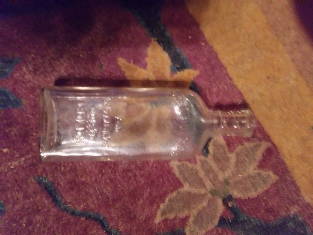 Antique creomulsion bottle