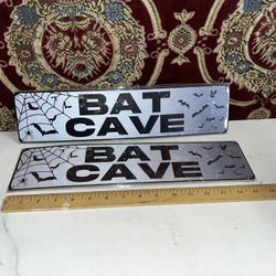 2 Bat Cave Signs (New In Plastic Packaging)