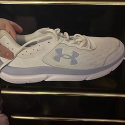women's Under Armour Charged Assert 10 running shoes in white