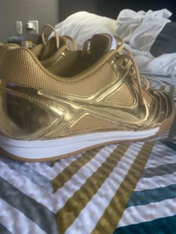 Gold Nikes size 13