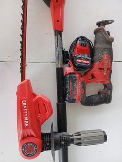 Craftman Hedge Trimmer And Saw  And 2 Batteries.