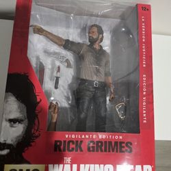 The walking dead Rick Grimes vigilante edition deluxe figure