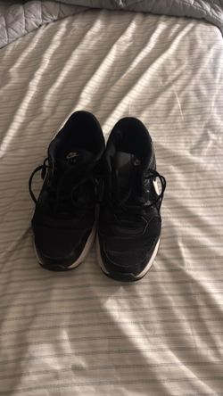 Black and white Nike running shoes