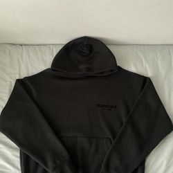 BLACK ESSENTIALS FEAR OF GOD HOODIE