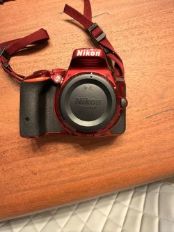 Nikon Camera, Flash Light And Tripod