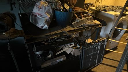 Heavy duty workbench thousand dollars, perfect condition good reliable on wheels tool doors, great bench