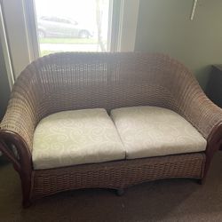 Vintage Wicker Chair & Ottoman with Carved Swan Accents Chair