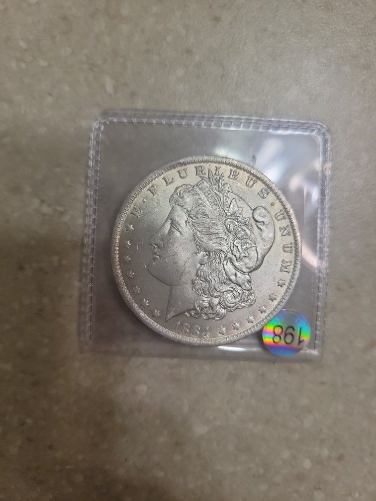 1884 O Morgan Silver Dollar. Uncirculated