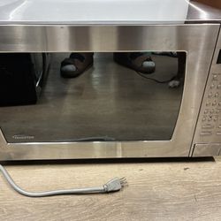 This is a Panasonic Genius Prestige NN-SN797S microwave oven.  