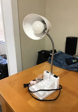 Desk lamp with charging outlet