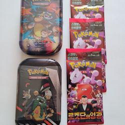 Poke'mon Tins And Imported Cards 