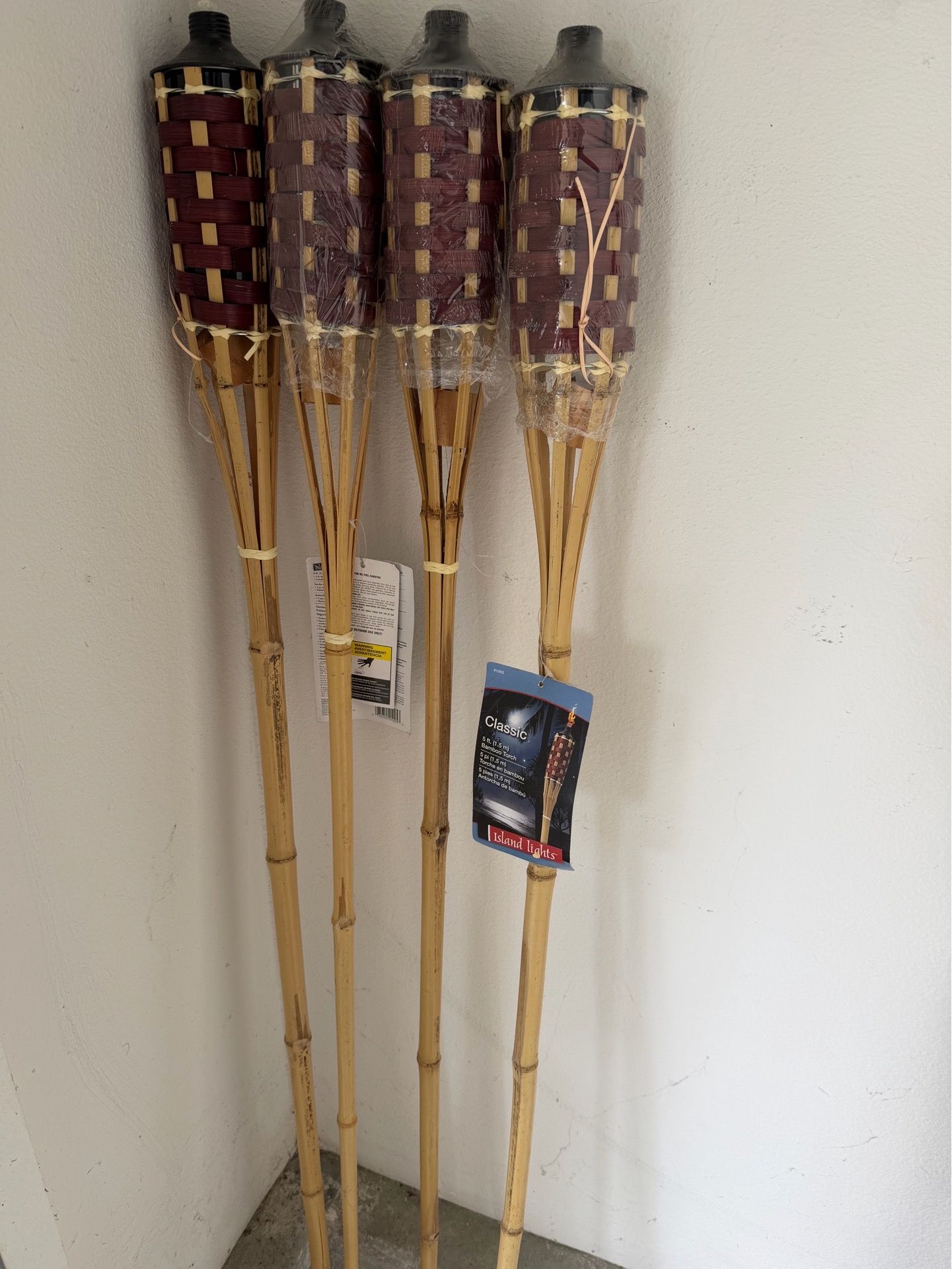 Tiki torches (4) and fuel