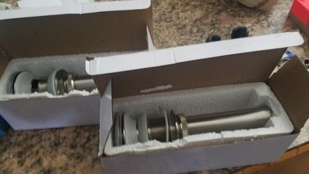 New 2 Bathroom faucets sink pop up drain stopper.