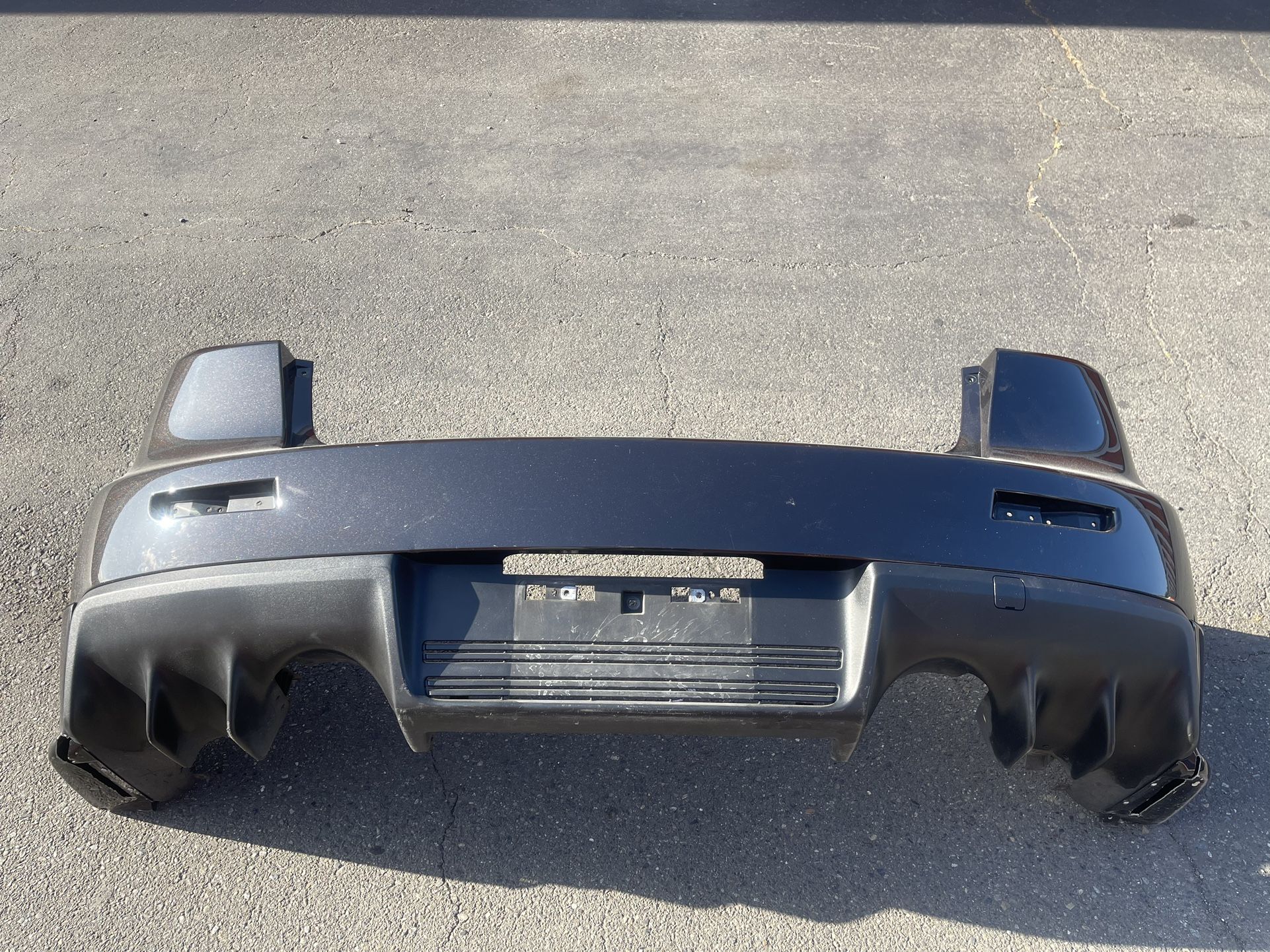 Evo X Phantom Black Oem Rear Bumper With Oem Rear Spats(cut)