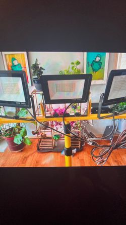 Professional 3-head adjustable LED work light stand with individual switches for complete lighting control. Delivers ultra-bright 21,000 lumens of day