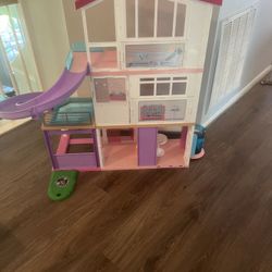 Barbie dream house and Barbies