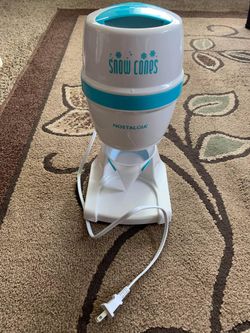 Nostalgia single snow cone maker with cup holder like brand new $12 pick up in sumas or could meet or deliver