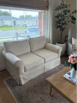 Living Spaces Cream Loveseat