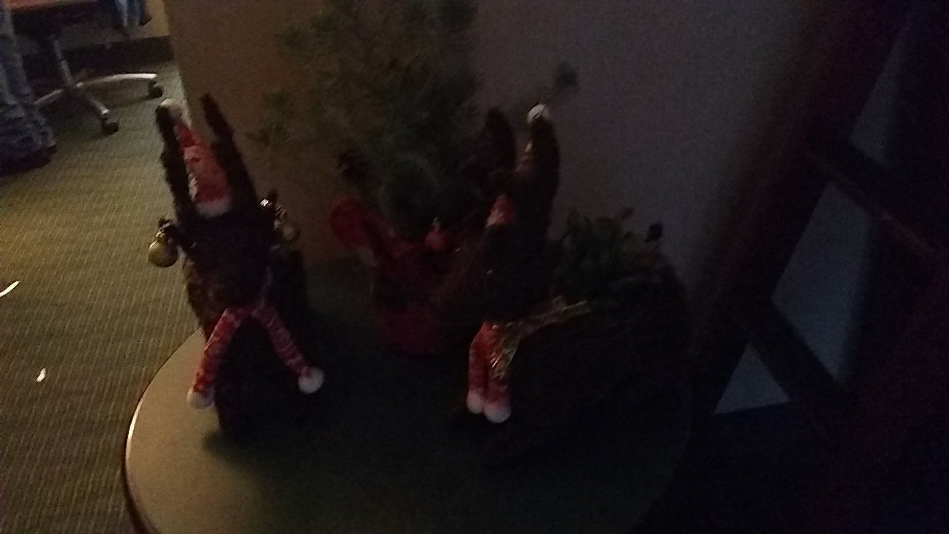 2 reindeer and a Christmas tree