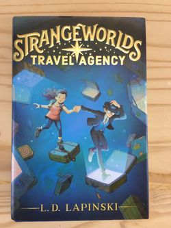 Strangeworlds Travel Agency by L.D. Lapinski - Blue Cover hardcover