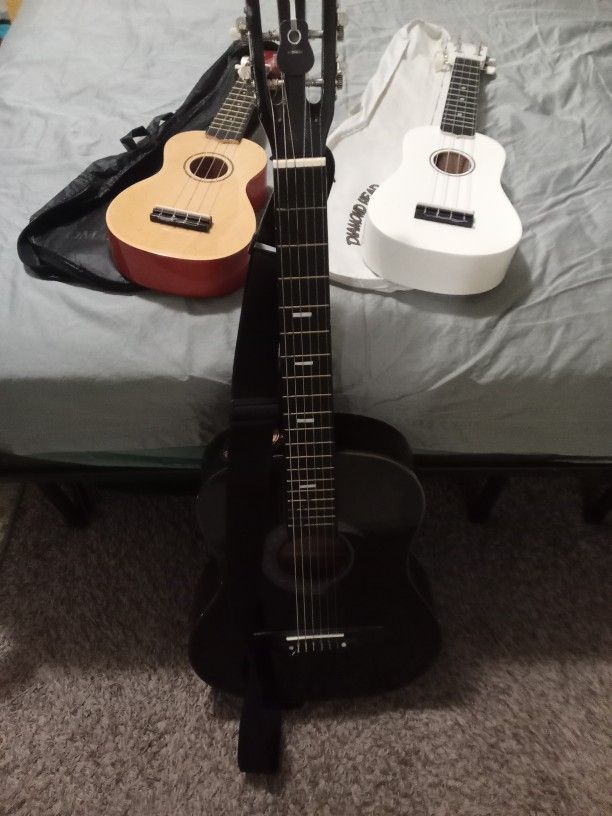 Acoustic Guitar and Two Ukuleles