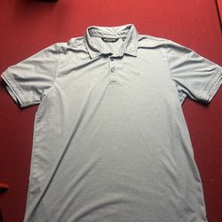 TravisMathew men's golf polo shirt in a gray