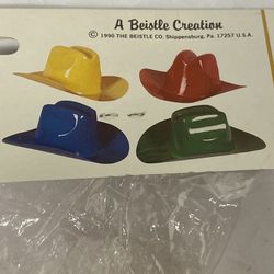 New 1990 Vintage  Beistle Cowboy Hats  New in package yellow red blue  green  plastic  8”  rubber string  Kids or pet photography would be a little sm