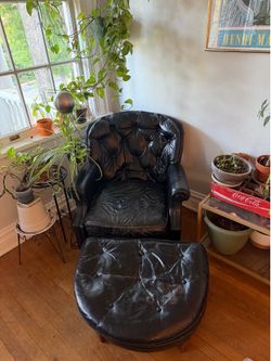 Black Leather Armchair and Ottoman