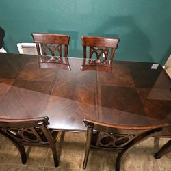 D577-35 Ashley Furniture Leighton Rectangular Extended Table With 6 Chairs and Glass Top Dining Room Table