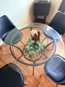 Glass dining table with chairs