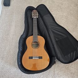 Guitar With Bag And Book Stand