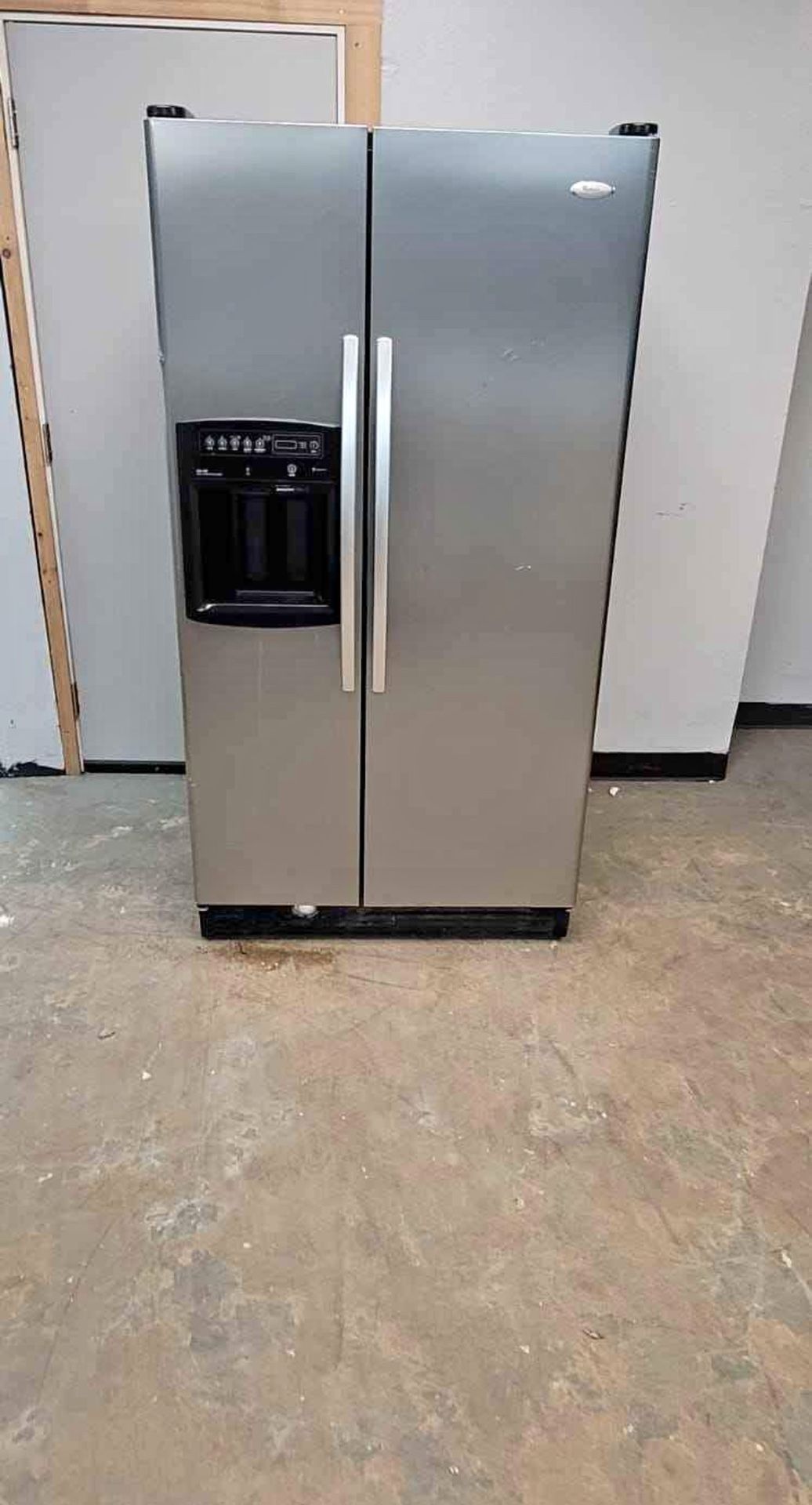 Whirlpool Double Door Stainless Steel Refrigerator.