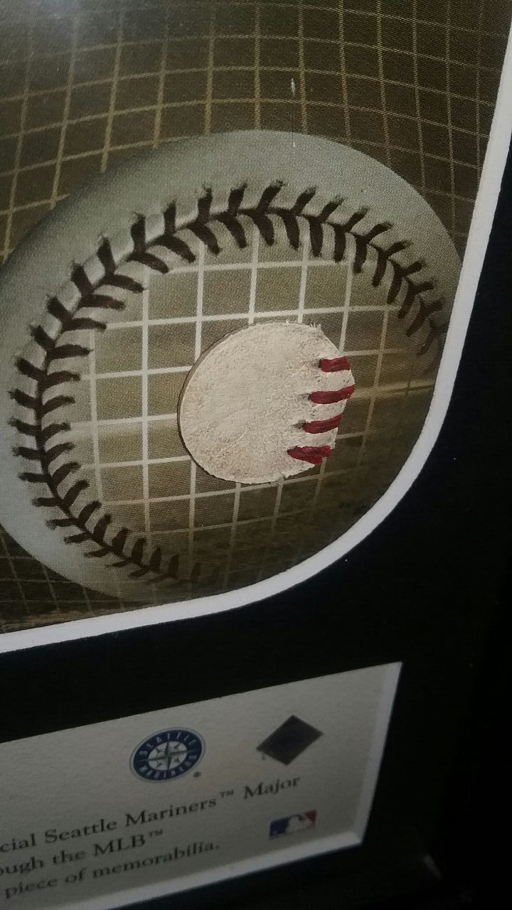 ICHIRO SUZUKI PICTURE WITH PIECE OF SEATTLE MARINERS GAME USED BASEBALL