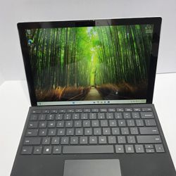 Powerful Microsoft Surface Pro. This laptop has an Intel i7-7660U processor. Comes with 16GB RAM and 1TB storage. Includes a detachable keyboard. WIND