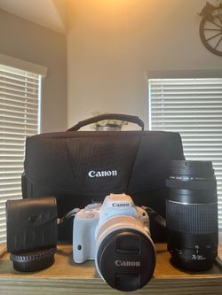 Canon EOS Rebel SL1 white, and 18-55m and 75-300mm