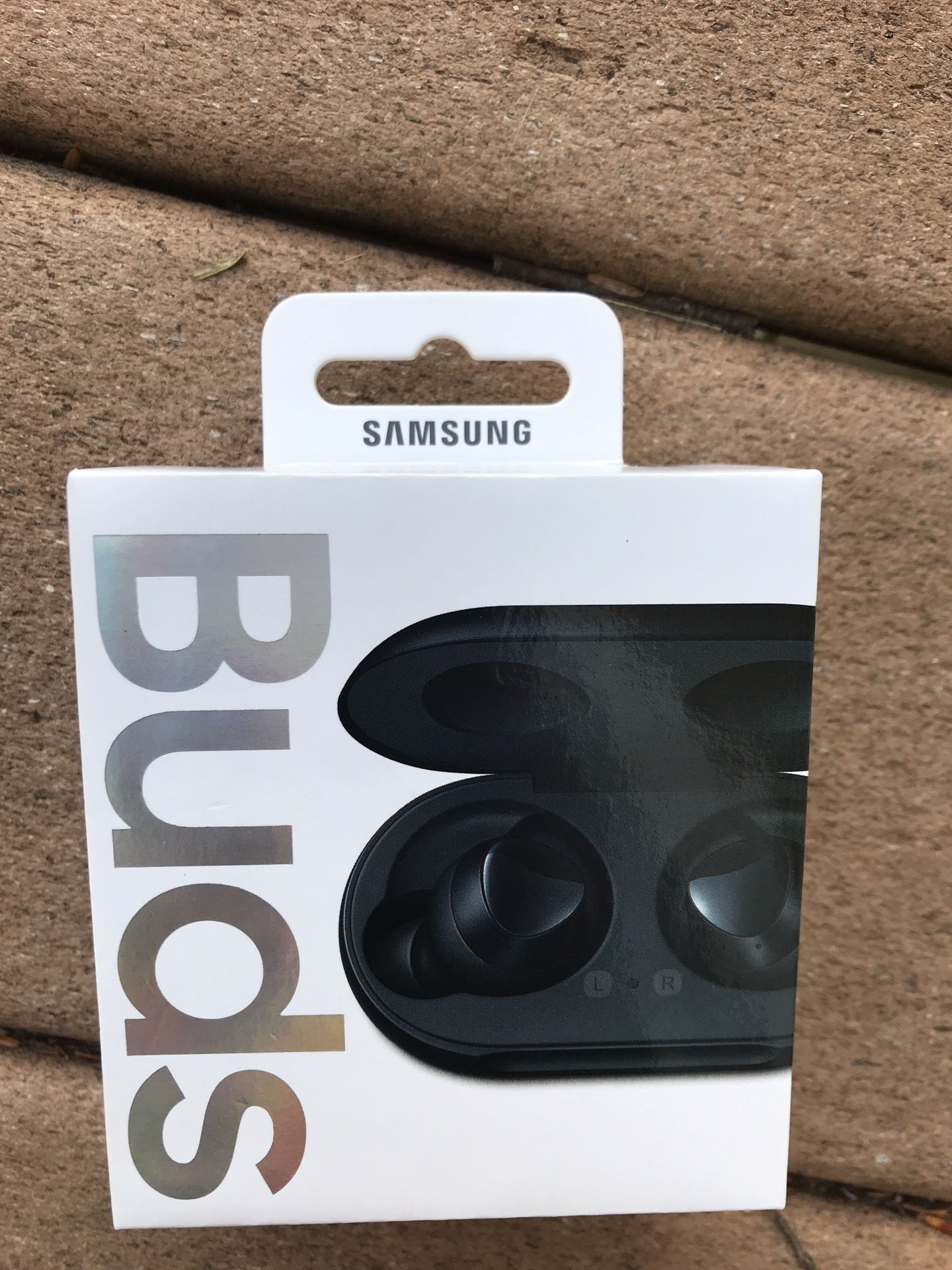 new in box Samsung Galaxy Buds, Black (Wireless Charging Case Included)
