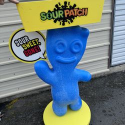 Sour Patch Display Blue On Wheels With Storage Basket On Top 